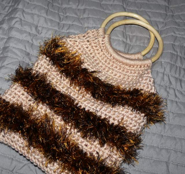Fluffy crochet bag with wood handles