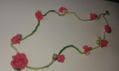 Beautiful crochet necklace with small roses
